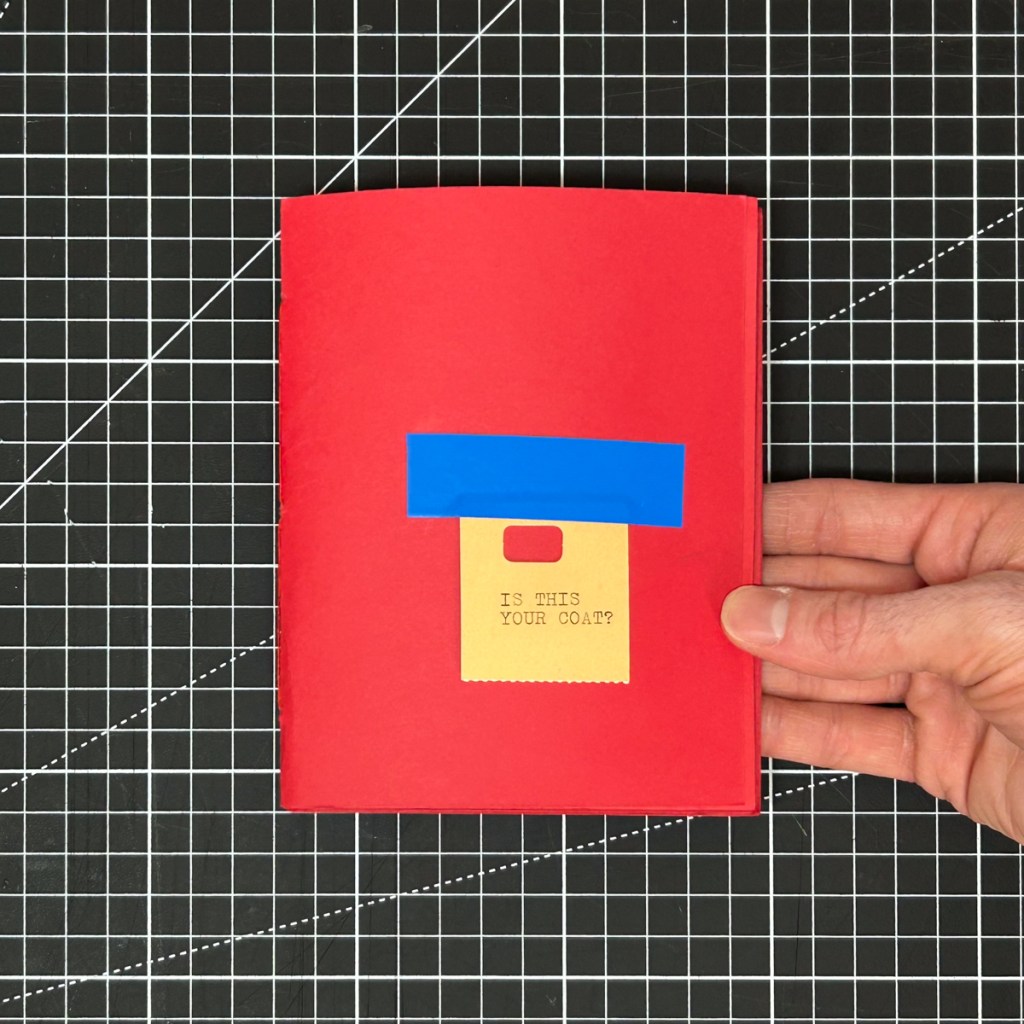 Is This Your Coat?, a handmade red zine by Sullivan Sweet with a yellow coat-check ticket and blue electrical tape on the cover.